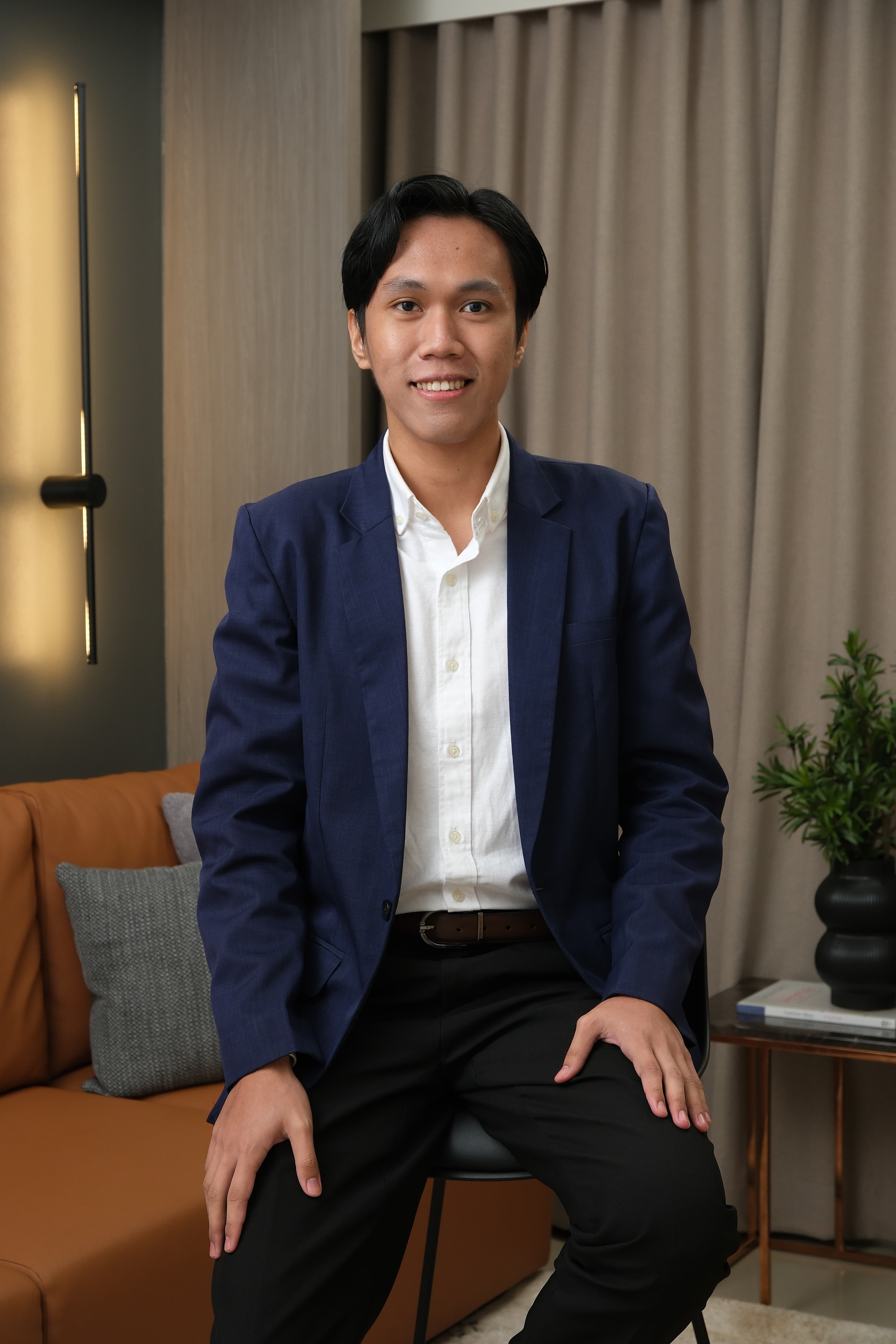 Portrait of Michael Ray B. Papasin, Property Specialist at Laurent Park